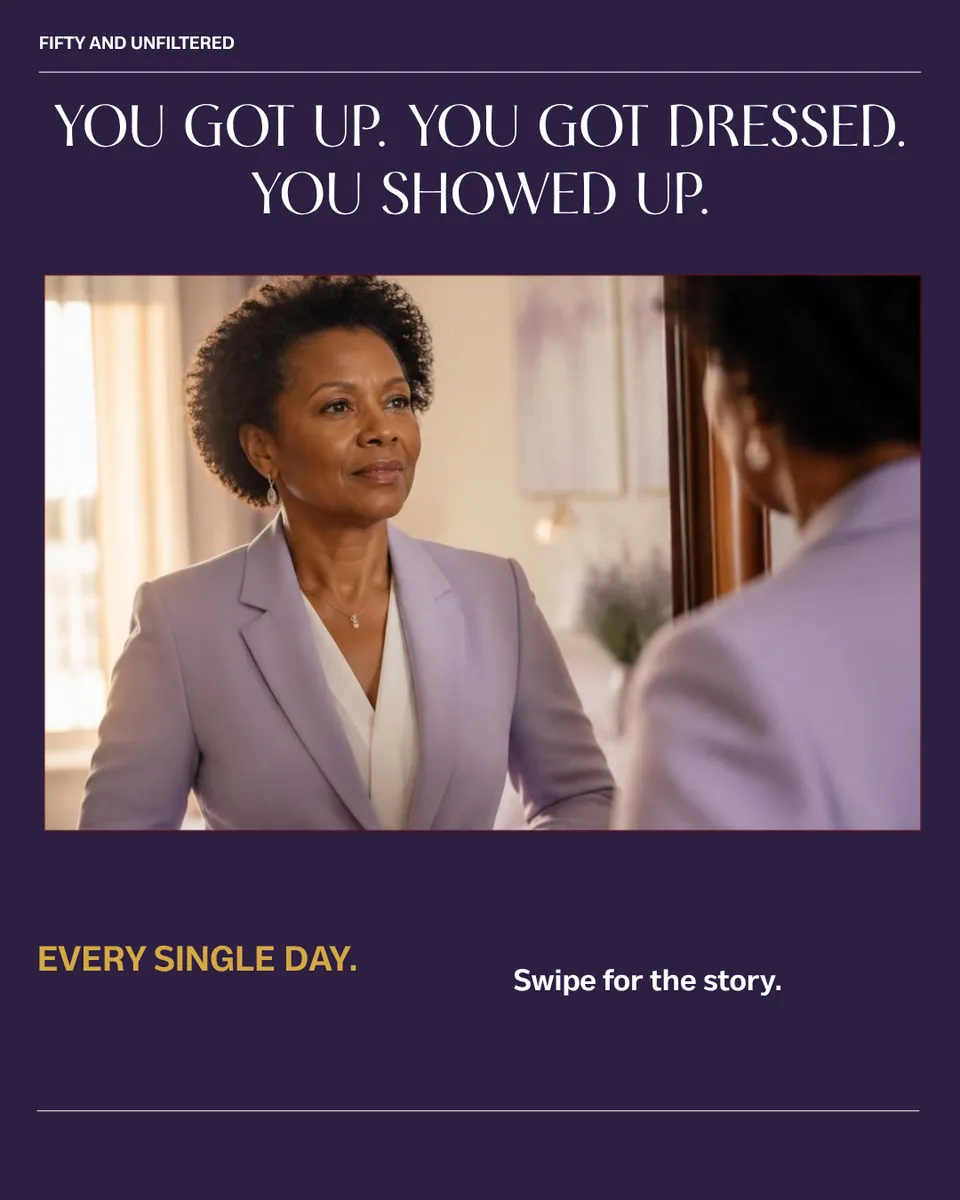 You got up. You got dressed. You showed up. Every single day. A Black woman in her 50s in a lavender blazer buttons her jacket in front of a mirror.
